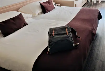 Ein Bett oder Betten in einem Zimmer der Unterkunft Wellnesshotel Schweizerhof