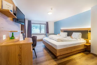 Ein Bett oder Betten in einem Zimmer der Unterkunft Hotel Kristall-Saphir Superior