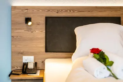 Ein Bett oder Betten in einem Zimmer der Unterkunft Hotel Kristall-Saphir Superior