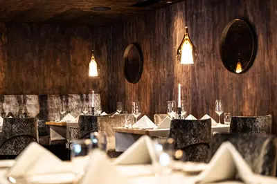 Ein Restaurant oder anderes Speiselokal in der Unterkunft Wellness Hotel Alpenhof