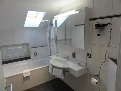 Ein Badezimmer in der Unterkunft Hotel Europa