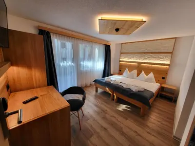 Ein Bett oder Betten in einem Zimmer der Unterkunft Hotel Europa