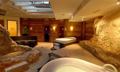 Ein Bett oder Betten in einem Zimmer der Unterkunft Saaserhof Apartments