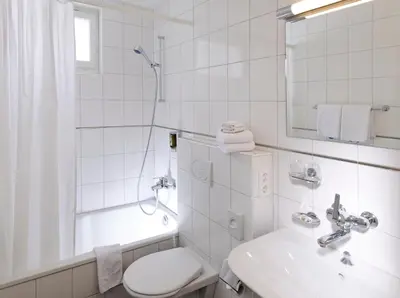 Ein Badezimmer in der Unterkunft Hotel Beausite