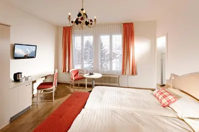 Ein Bett oder Betten in einem Zimmer der Unterkunft Hotel Beausite