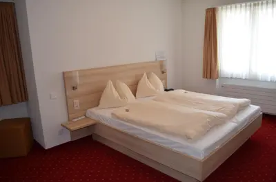 Ein Bett oder Betten in einem Zimmer der Unterkunft Hotel Kreuz