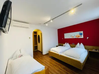 Ein Bett oder Betten in einem Zimmer der Unterkunft Hotel Toscana