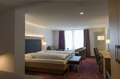 Ein Bett oder Betten in einem Zimmer der Unterkunft Hotel Seeburg - Adults only