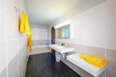 Ein Badezimmer in der Unterkunft Hotel Mountime
