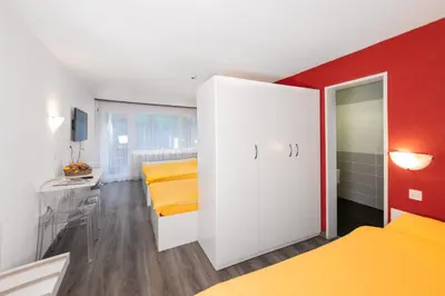 Ein Bett oder Betten in einem Zimmer der Unterkunft Hotel Mountime