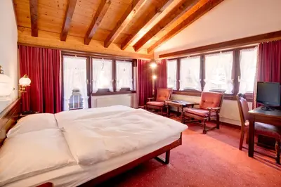 Ein Bett oder Betten in einem Zimmer der Unterkunft Hotel Astoria