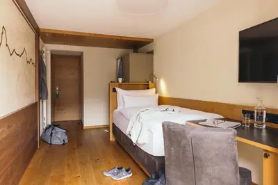 Ein Bett oder Betten in einem Zimmer der Unterkunft la couronne Hotel & Spa