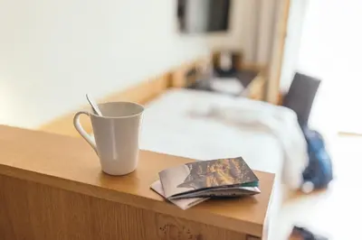 Ein Bett oder Betten in einem Zimmer der Unterkunft la couronne Hotel & Spa