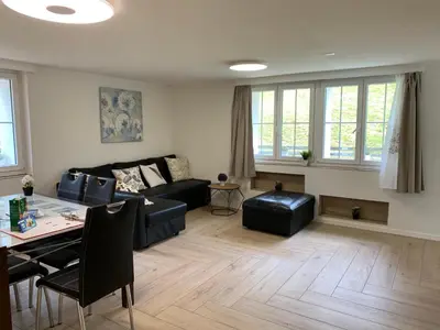 Ein Sitzbereich in der Unterkunft Eiger, Jungfrau, luxury garden apartment