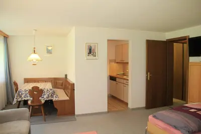 Ein Sitzbereich in der Unterkunft Haus Pan