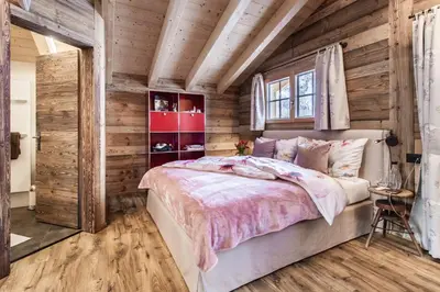 Ein Bett oder Betten in einem Zimmer der Unterkunft Mountain Chalet 4 You