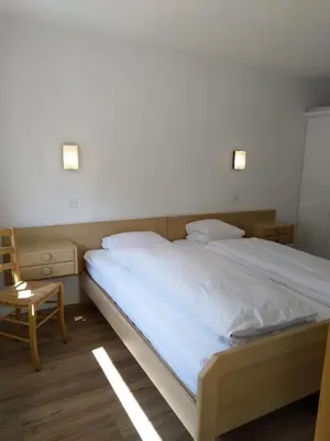 Ein Bett oder Betten in einem Zimmer der Unterkunft Fortuna 404