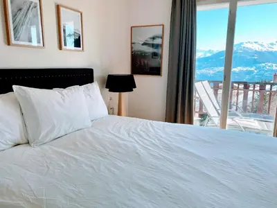 Ein Bett oder Betten in einem Zimmer der Unterkunft Apartment Del Sol Elysée 4 Crans Montana Switzerland