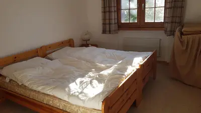 Ein Bett oder Betten in einem Zimmer der Unterkunft Ferienwohnung Silberdistel
