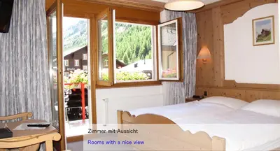 Ein Bett oder Betten in einem Zimmer der Unterkunft Hotel Restaurant Mattmarkblick