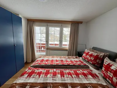 Ein Bett oder Betten in einem Zimmer der Unterkunft Haus Vira