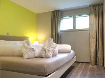 Ein Bett oder Betten in einem Zimmer der Unterkunft Apartment Dione by Interhome