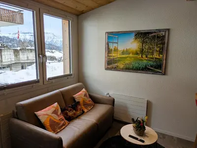 Ein Sitzbereich in der Unterkunft Chalet Lilo New Studio