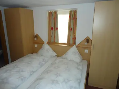 Ein Bett oder Betten in einem Zimmer der Unterkunft Hotel Monte-Moro