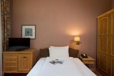 TV/Unterhaltungsangebot in der Unterkunft Grand Hotel Beau Rivage Interlaken