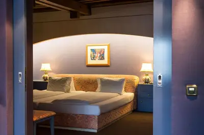 Ein Bett oder Betten in einem Zimmer der Unterkunft Grand Hotel Beau Rivage Interlaken