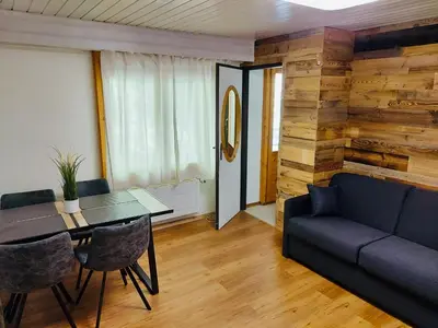 Ein Sitzbereich in der Unterkunft Charmant petit appartement à Grimentz au pied des pistes