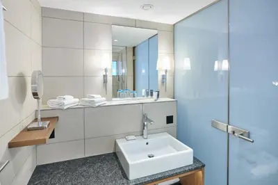 Ein Badezimmer in der Unterkunft Belvédère Strandhotel