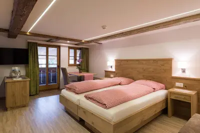 Ein Bett oder Betten in einem Zimmer der Unterkunft Hotel Restaurant Hirschen