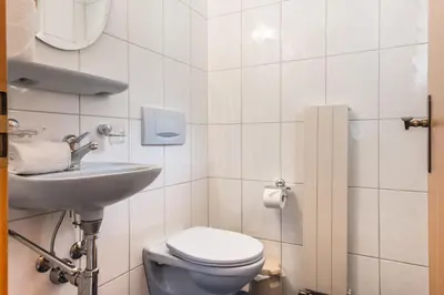 Ein Badezimmer in der Unterkunft Apartment Schneerose - GRIWA RENT AG