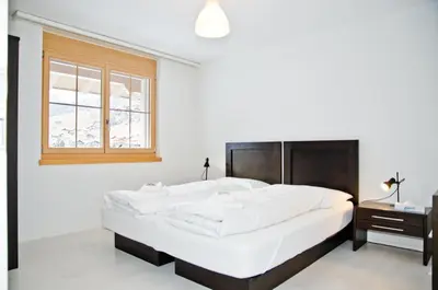 Ein Bett oder Betten in einem Zimmer der Unterkunft Apartment Alpha - GRIWA RENT AG