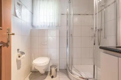 Ein Badezimmer in der Unterkunft Apartment St. Louis 2.5 - GriwaRent AG