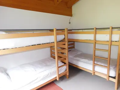 Ein Bett oder Betten in einem Zimmer der Unterkunft Residence Edelweiss A131