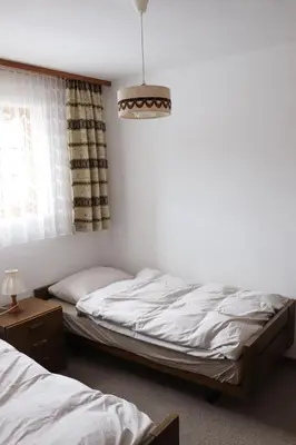 Ein Bett oder Betten in einem Zimmer der Unterkunft Schönegg Hochparterre