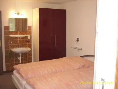 Ein Bett oder Betten in einem Zimmer der Unterkunft Haus Apollo