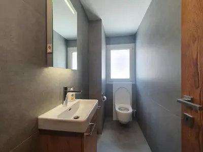 Ein Badezimmer in der Unterkunft Waldrain 5