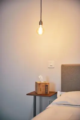 Ein Bett oder Betten in einem Zimmer der Unterkunft Italian Lifestyle Hotel & Osteria Chartreuse