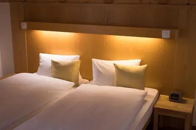 Ein Bett oder Betten in einem Zimmer der Unterkunft Blümlisalp