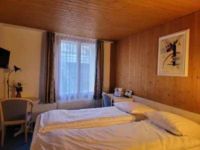 Ein Bett oder Betten in einem Zimmer der Unterkunft Dinh Residence