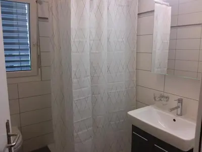 Ein Badezimmer in der Unterkunft Ferienwohnung 