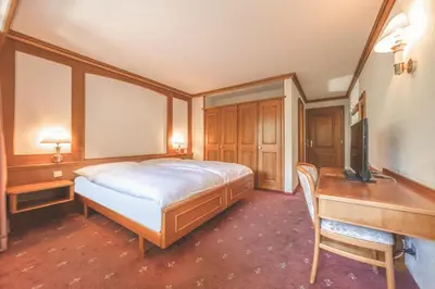 Ein Bett oder Betten in einem Zimmer der Unterkunft Antares Hotel