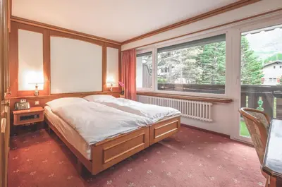 Ein Bett oder Betten in einem Zimmer der Unterkunft Antares Hotel