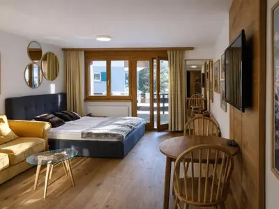 Ein Sitzbereich in der Unterkunft Bright studio with balcony & view to the Matterhorn