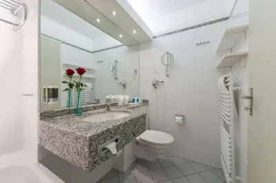 Ein Badezimmer in der Unterkunft Dorint Blüemlisalp Beatenberg/Interlaken