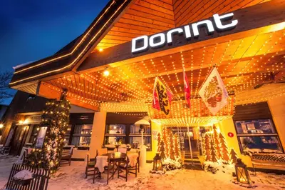 Ein Restaurant oder anderes Speiselokal in der Unterkunft Dorint Blüemlisalp Beatenberg/Interlaken