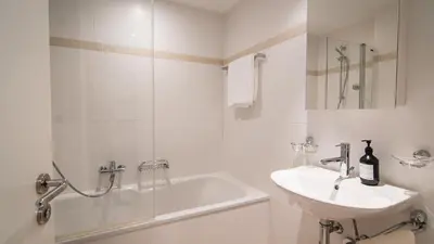 Ein Badezimmer in der Unterkunft Aramis Apartment 3-1